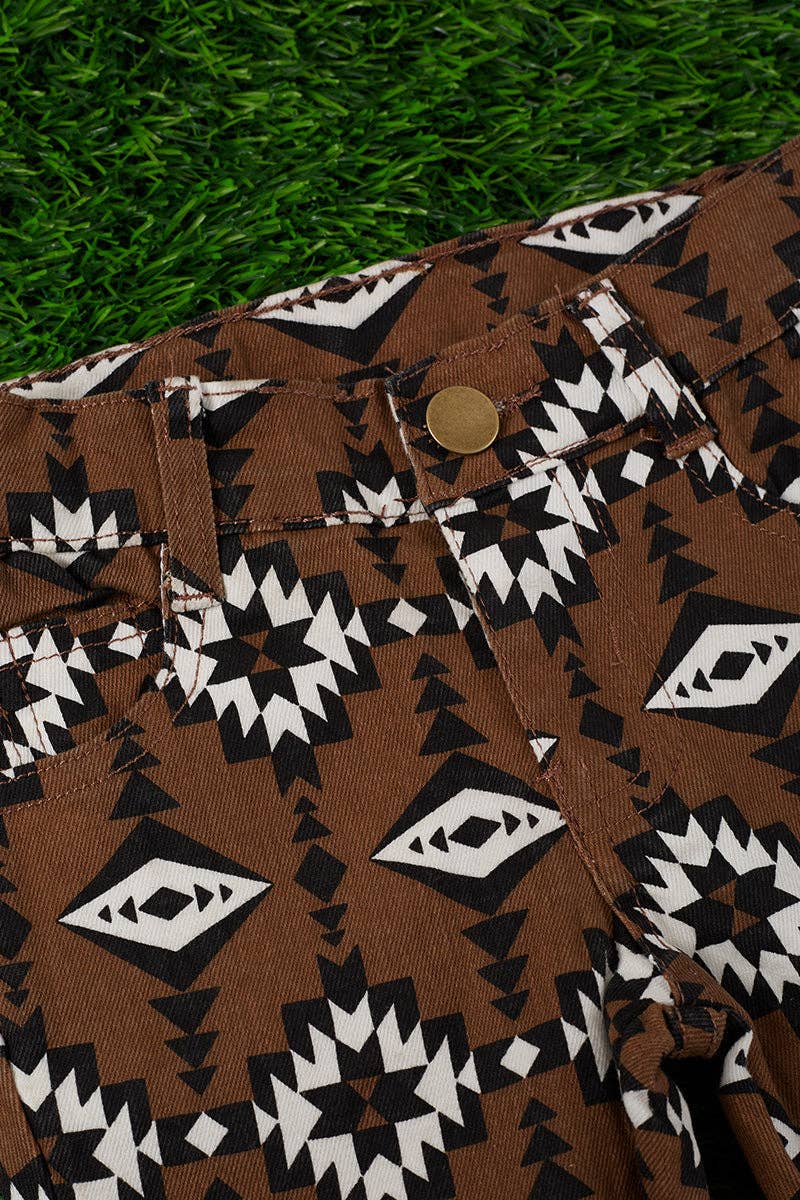 Brown aztec printed bootcut denim pants. PNG25153091 amy